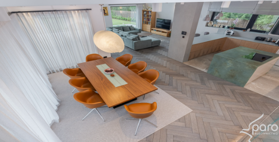 Salon z kuchnią o powierzchni ponad 80 m² w domu premium – generalny wykonawca Paro